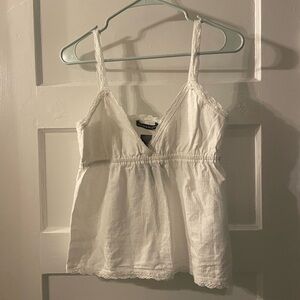 NWT (never worn) Brandy Melville white lace top. Retails for $24.